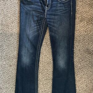 Blue Boot Cut Jeans with Vintage Fading
